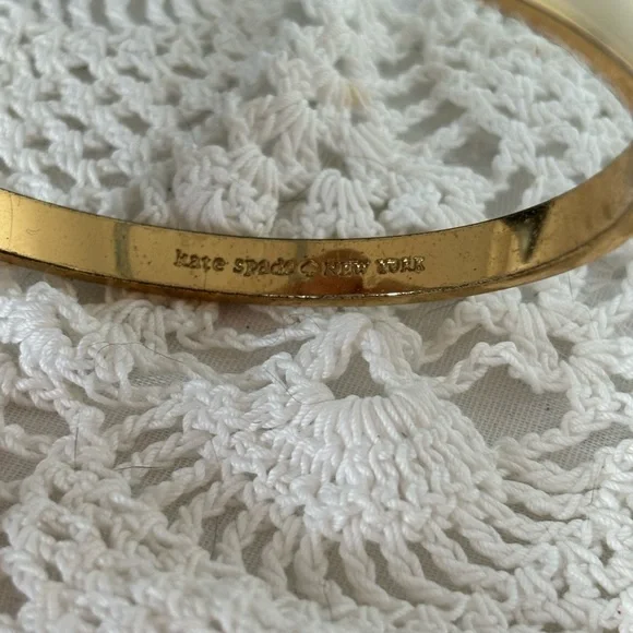 Kate Spade Gold and Cream Bow Bracelet - Picture 3 of 7